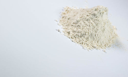 High angle view of bread against white background