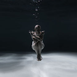 Woman swimming in sea