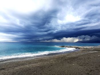 Scenic view of beach against sky