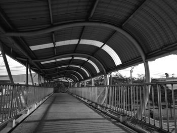 Footbridge against sky