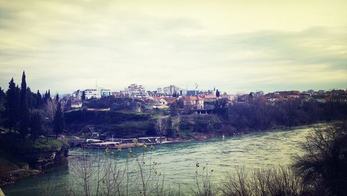 View of river against cloudy sky