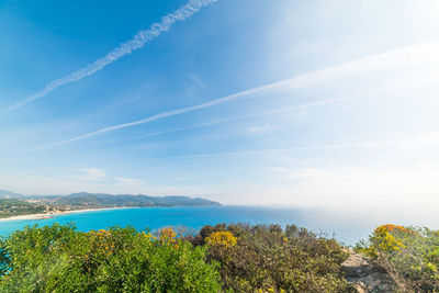 Scenic view of sea against blue sky