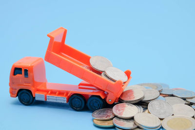 Close-up of toy car against blue background