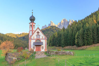 Church san giovanni in val di funes in front of geisler mountains in villnoess valley