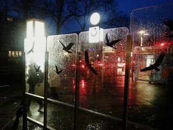 Illuminated street light at night
