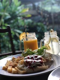 Close-up of fruits served on table