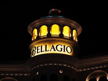 Low angle view of illuminated building at night