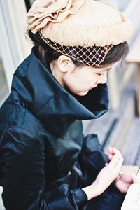 High angle view of boy looking at camera