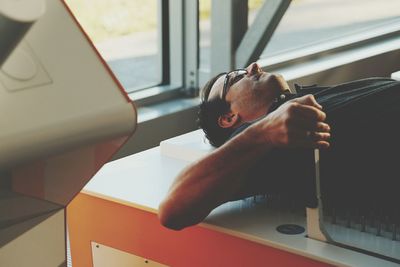 Close-up of man using mobile phone