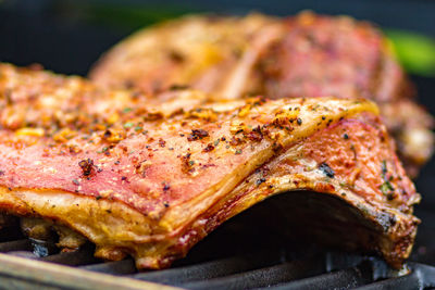 Close-up of meat on barbecue grill