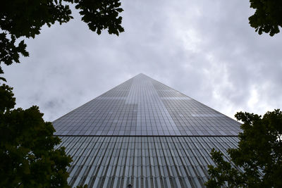 Low angle view of one world trade center against sky