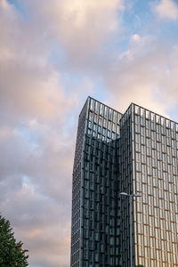 Low angle view of modern building against sky