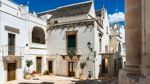 Streets of locorotondo. between white houses and dreamlike architecture. puglia to love, italy