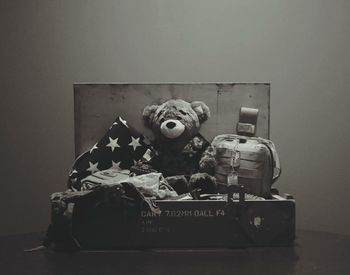 Close-up of stuffed toy against gray background