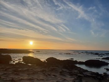 Scenic view of sea against sky during sunset