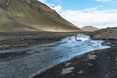 Fording river in highlands