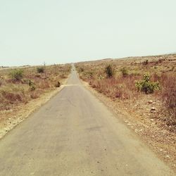 Country road passing through landscape