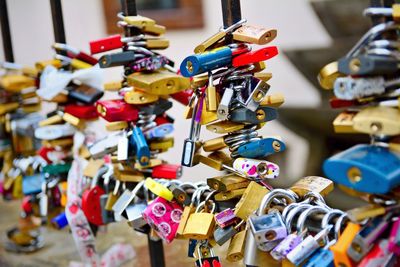 Close-up of padlocks hanging on metal