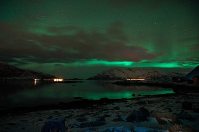 Scenic view of sea against sky at night