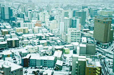 Aerial view of cityscape during winter