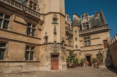 Low angle view of historical building against sky