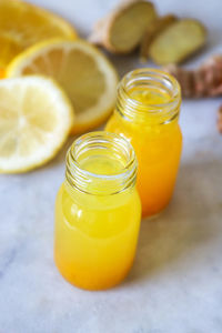 Close-up of juice in glass jar on table