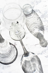 High angle view of glass bottle on table