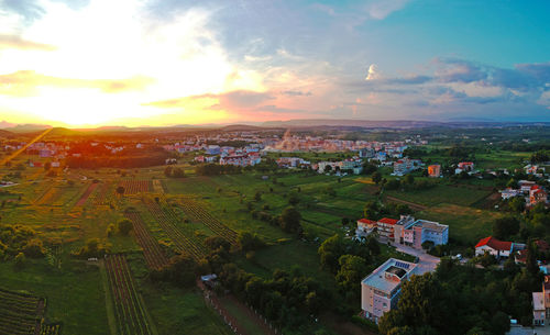High angle view of townscape against sky during sunset