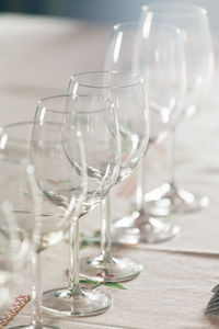 Row of empty wineglasses on table