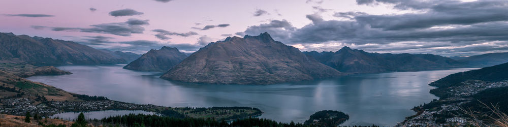 Panoramic view of lake and mountains against sky