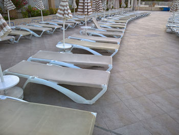 Empty chairs and tables in restaurant