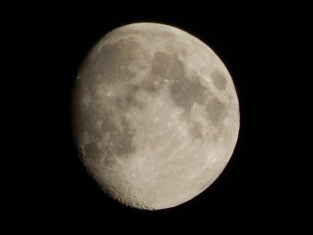 Low angle view of moon against sky at night