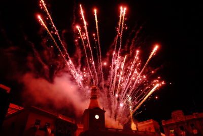 Low angle view of firework display