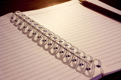 High angle view of books on paper