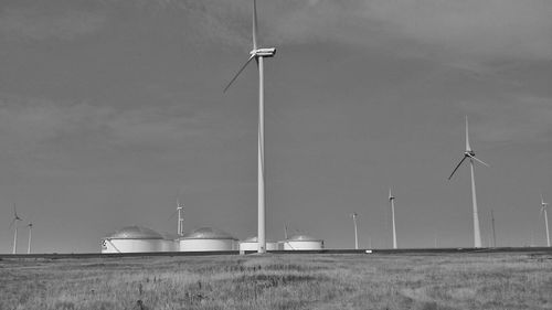 Wind turbines in field