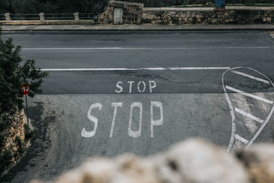 High angle view of text on road