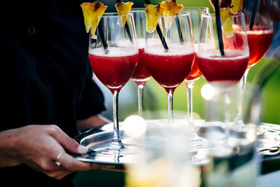 Pouring and serving champagne in a luxury social events like weddings and party.