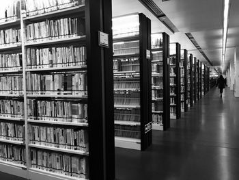 Bookshelves in illuminated library