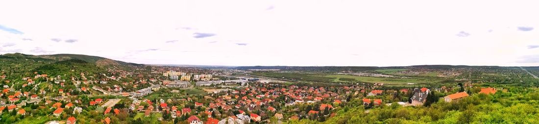 High angle view of people on landscape against sky