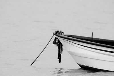 Fishing boat on beach in black and white 