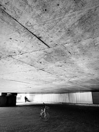 Bicycle parked below building