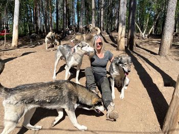 Women and dogs in the forest