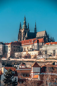 High angle view of buildings in city against clear sky