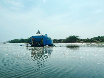 Scenic view of sea against blue sky