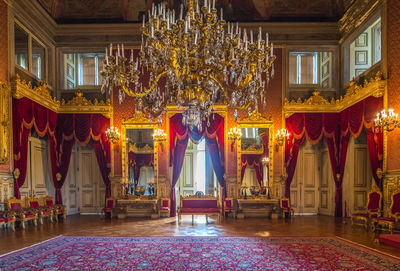 Illuminated chandelier in building