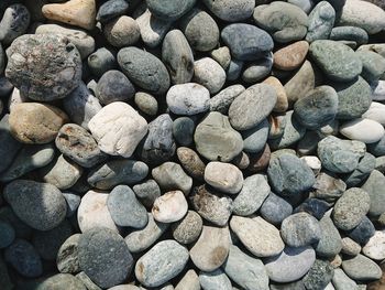 Full frame shot of pebbles at beach