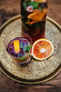 High angle view of drink on plate at table