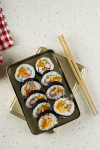 Kimbap, korean style rolled rice sushi on korean traditional metal lunchbox