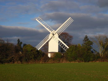 Wind turbines in field