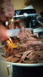 Close-up of meat on barbecue grill